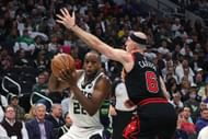 Khris Middleton, left and Alex Caruso